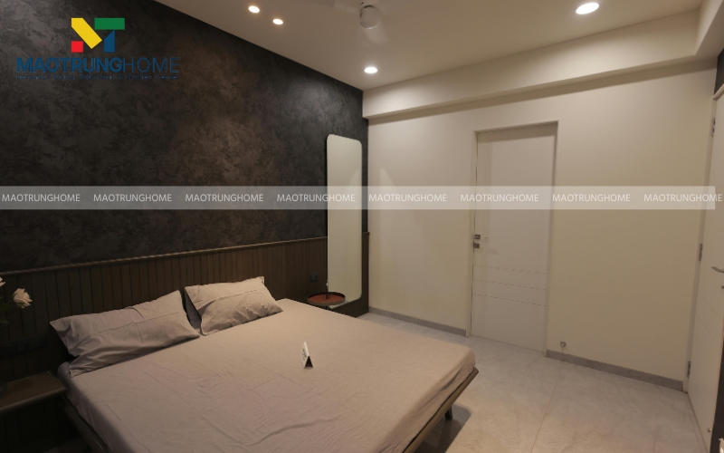 Phòng ngủ ốp gạch giả đá full tường sang trọng 