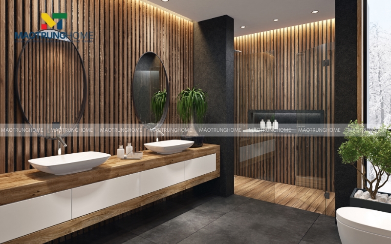Bàn lavabo bằng gỗ tự nhiên, xung quanh là cây xanh trang trí