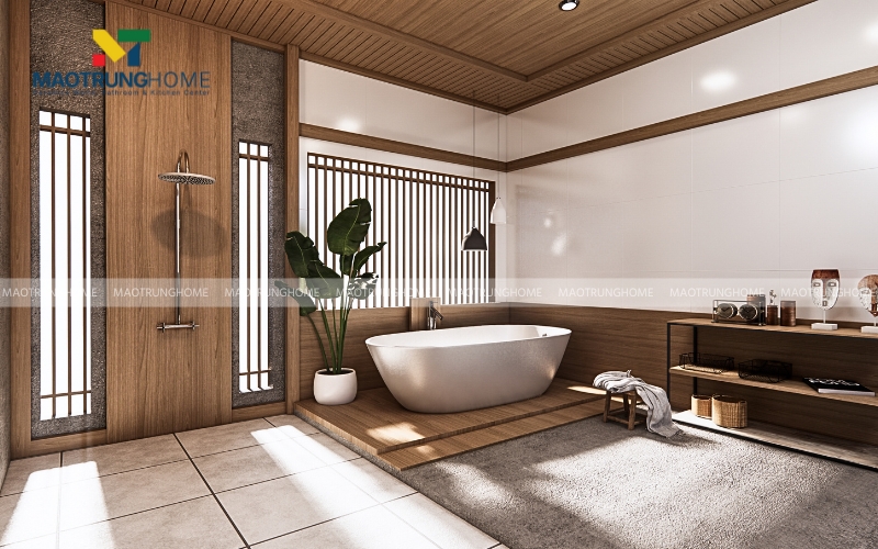 Bồn tắm jacuzzi ngoài trời được bao quanh bởi sàn gỗ và cây xanh